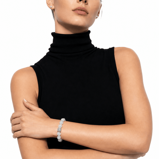 Natural Moonstone bracelet styled with a black sleeveless turtleneck outfit