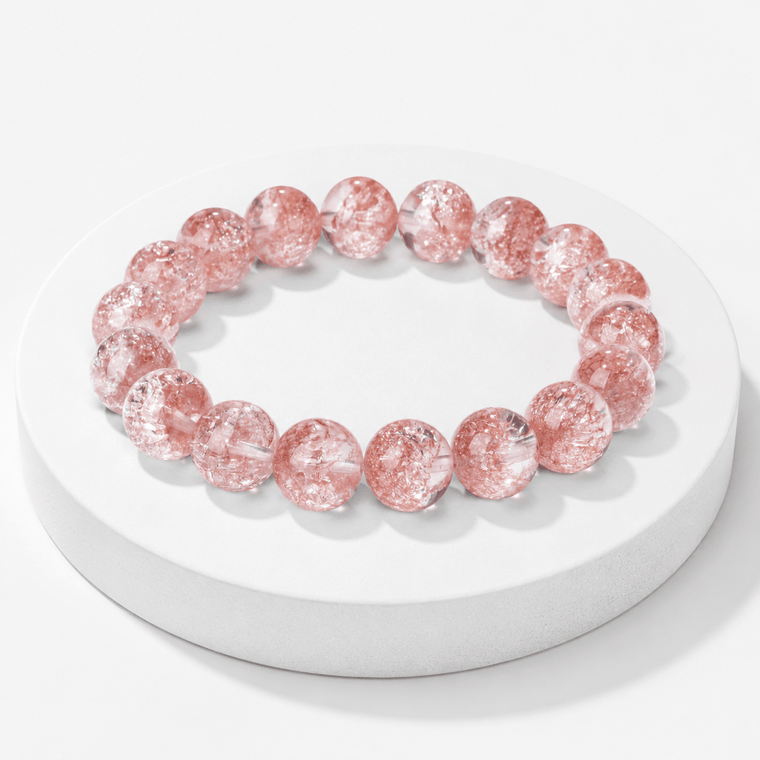 Good Things Find Me bracelet displayed on white pedestal with sparkling 7A Pink Super Seven crystal beads