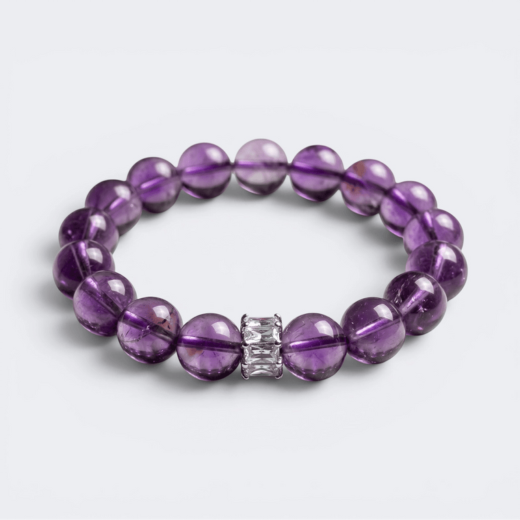 Front view of A Clear Way Through bracelet with 10mm natural Amethyst beads and silver-tone rectangular accent