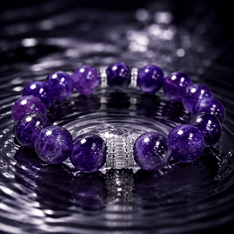 A Still Mind Amethyst bracelet styled on a dark reflective water surface