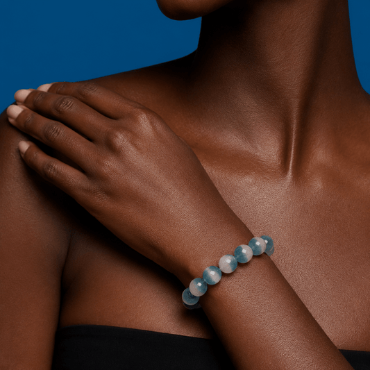Natural Blue Fluorite bracelet styled against a deep blue editorial background