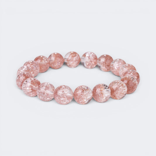 Front view of Good Things Find Me bracelet with 10mm 7A Pink Smoky Super Seven crystal beads and golden inclusions