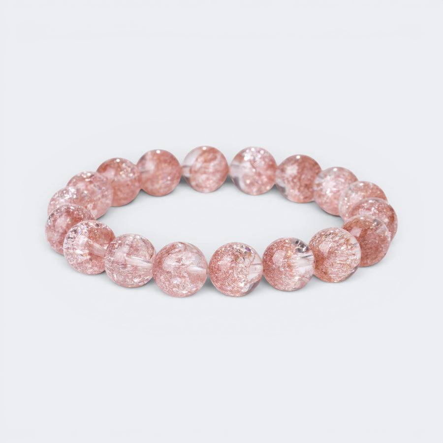 Front view of Good Things Find Me bracelet with 10mm 7A Pink Smoky Super Seven crystal beads and golden inclusions