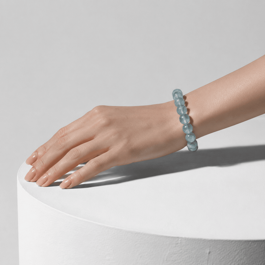 Translucent Green Fluorite bracelet worn in a minimalist sunlit setting