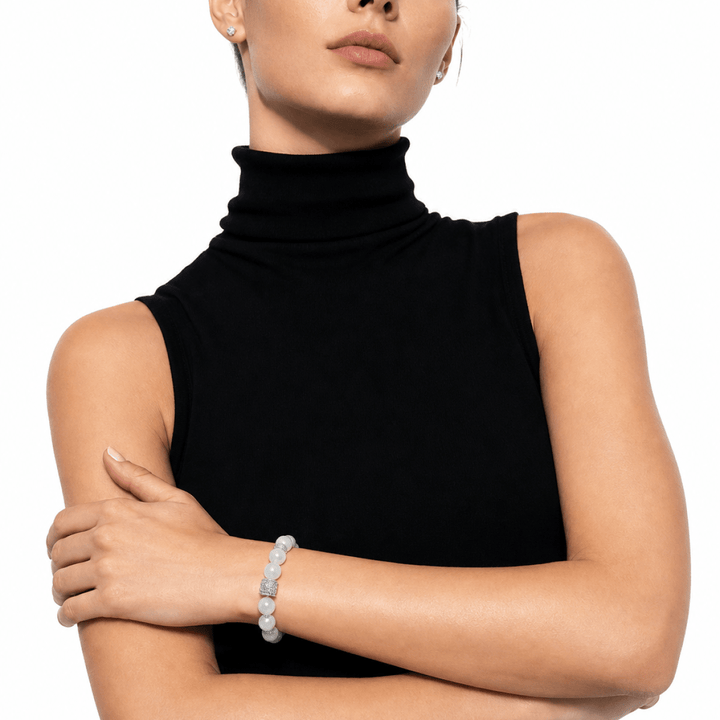 Natural Moonstone bracelet styled with a black sleeveless turtleneck outfit