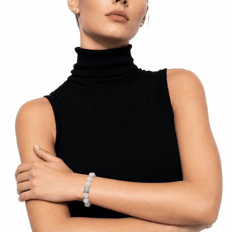 Natural Moonstone bracelet styled with a black sleeveless turtleneck outfit