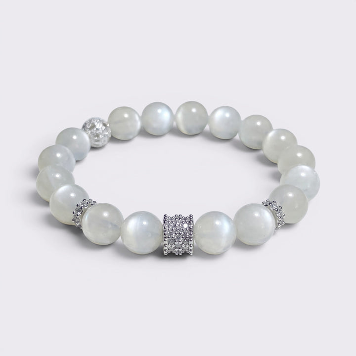 Front view of I Am Softly Held bracelet with 10mm natural Moonstone beads and silver-tone textured spacer accents