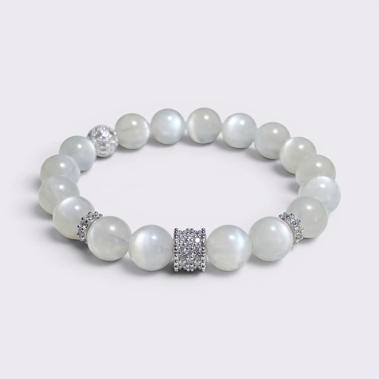 Front view of I Am Softly Held bracelet with 10mm natural Moonstone beads and silver-tone textured spacer accents
