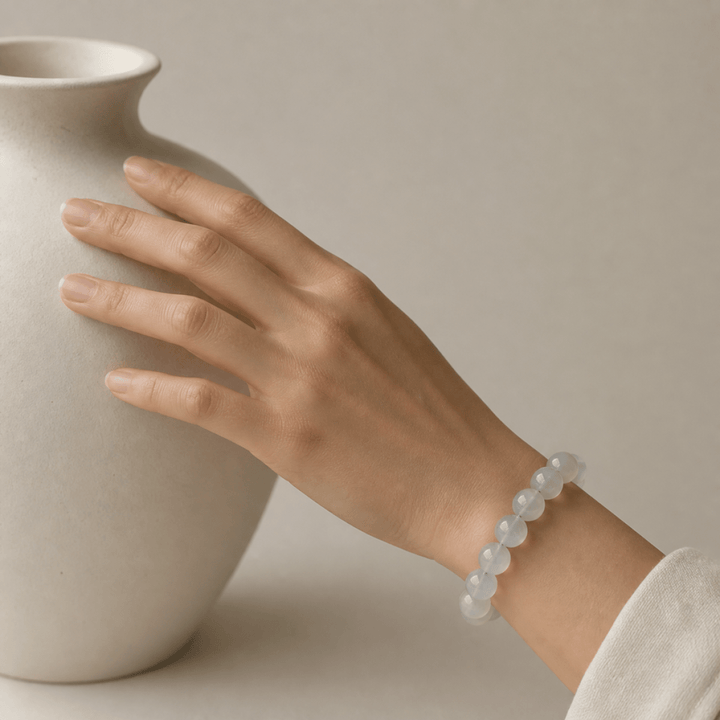 White Moonstone bracelet displayed inside a luminous shell with soft pearl-like texture
