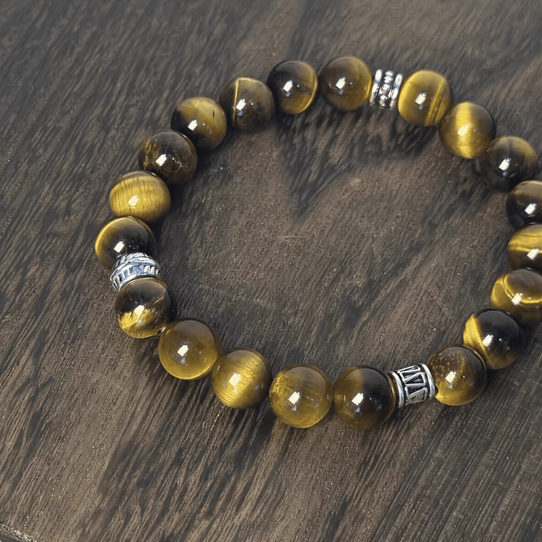 Material detail of natural Tiger's Eye beads and silver-tone accents