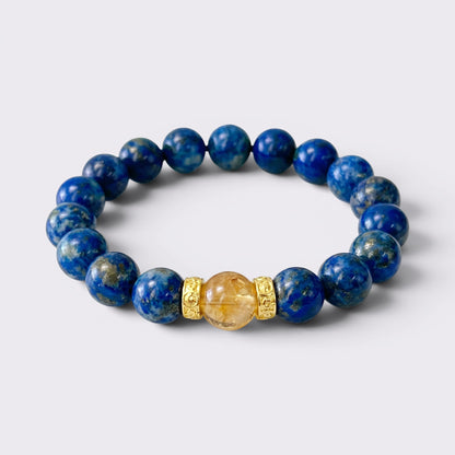 Natural Lapis Lazuli bracelet with 8mm blue beads, Citrine focal stone, and gold-tone spacers
