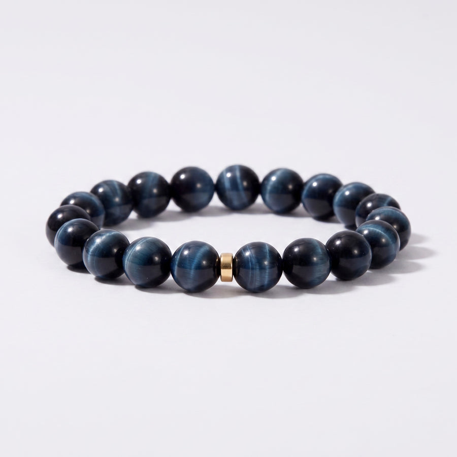 Front view of I Stand Steady bracelet with 10mm natural Blue Tiger's Eye beads and gold-tone spacer accent