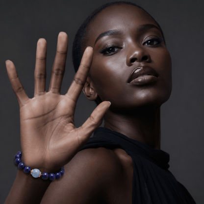 Lapis Lazuli bracelet with Aquamarine focal bead shown on model wrist