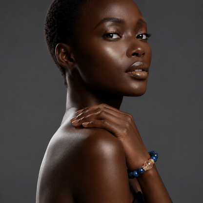 Lapis Lazuli and Citrine bracelet worn in a dark-gray editorial portrait