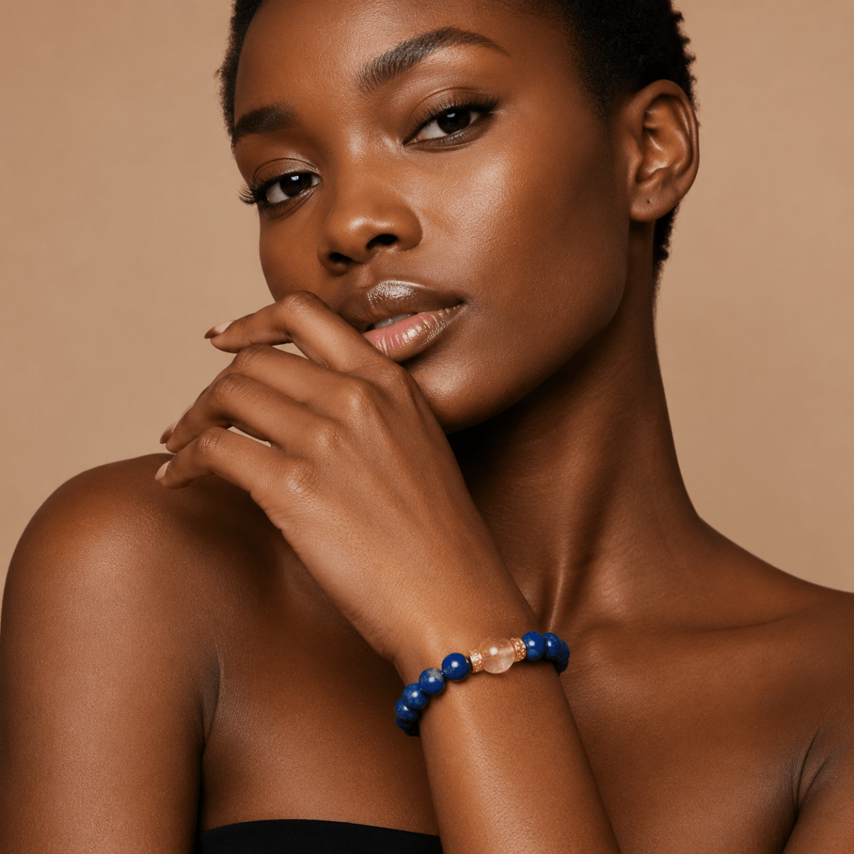 Natural Lapis Lazuli bracelet with Citrine centerpiece worn against a warm neutral background