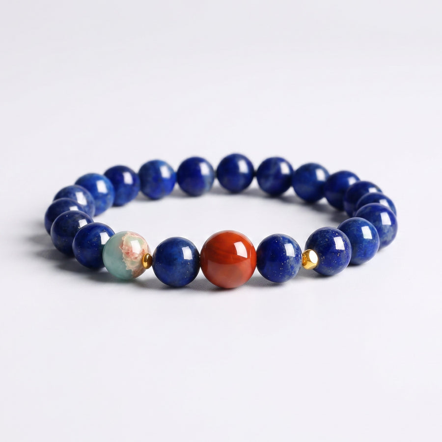 Natural Lapis Lazuli bracelet with Nanhong Agate focal bead, decorative accent bead and gold-tone details
