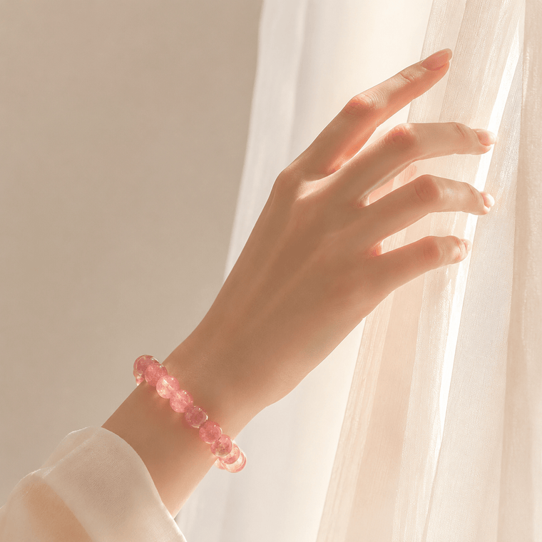 Loved As I Am Rose Quartz bracelet worn near soft window light
