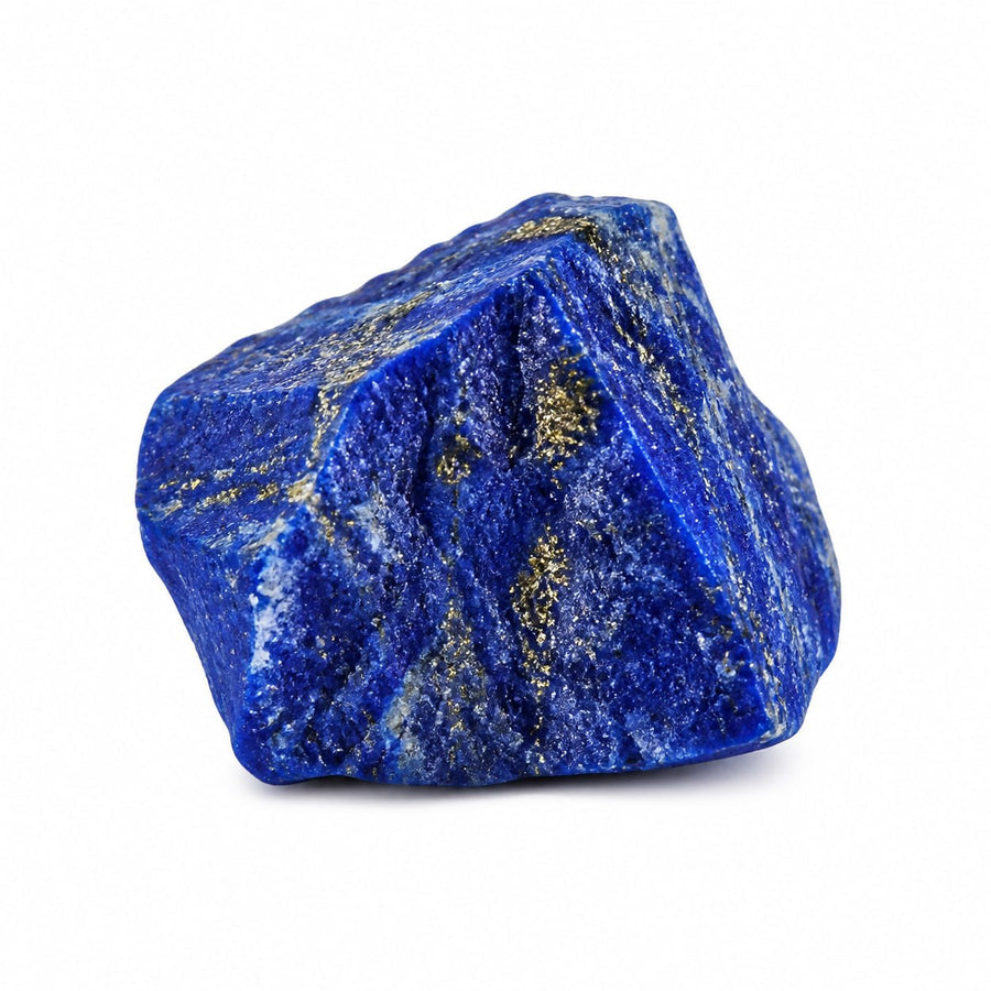 Raw lapis lazuli stone with golden pyrite flecks on a white background