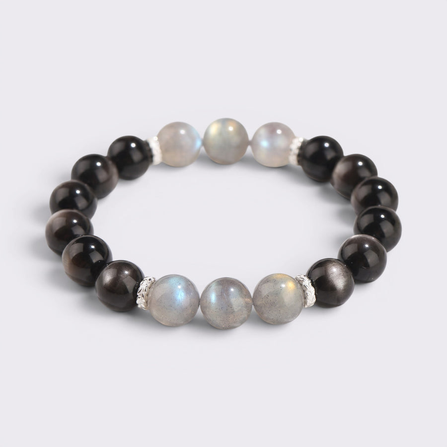 Front view of My Energy Is Mine bracelet with 10mm natural Obsidian beads and 6 Gray Moonstone accent beads