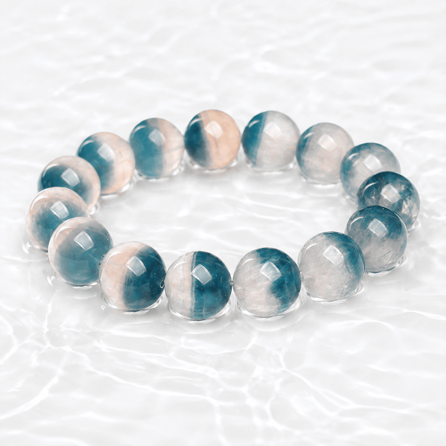 Natural Blue Fluorite bracelet displayed on a luminous white water-textured surface