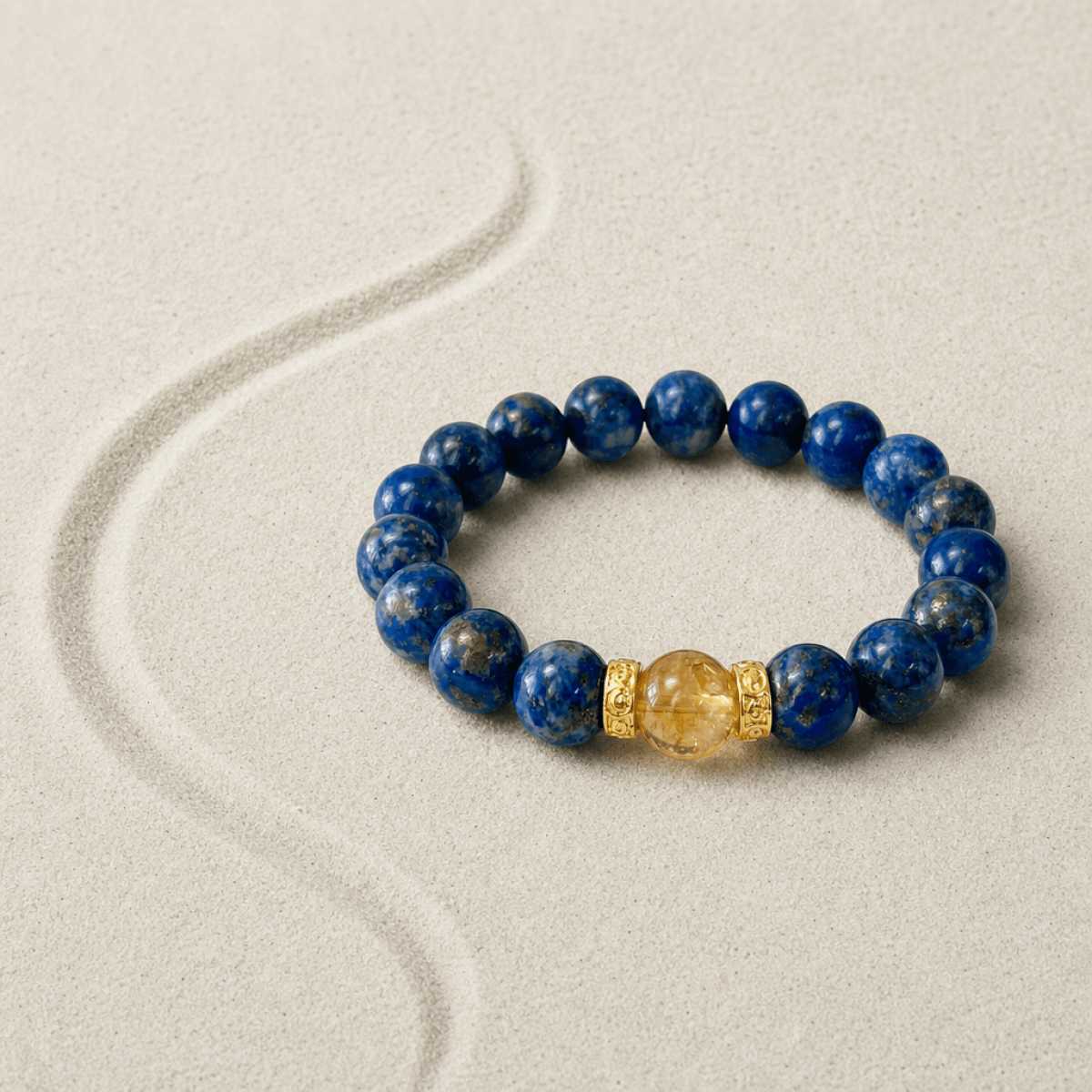 Lapis Lazuli and Citrine bracelet displayed on a textured beige surface