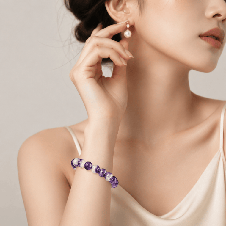 Natural Purple Fluorite bracelet styled with an ivory satin outfit and pearl earring