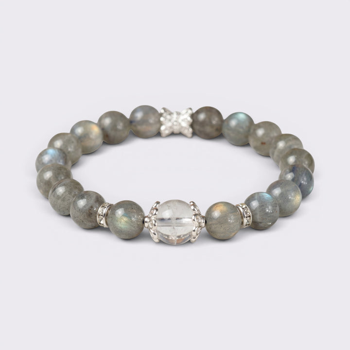 Front view of Written in the Stars bracelet with 8.5mm Blue Gray Moonstone beads, 10mm Clear Quartz focal bead, and silver-tone accents