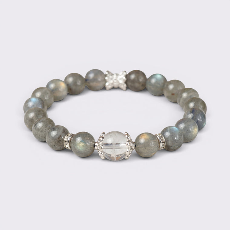 Front view of Written in the Stars bracelet with 8.5mm Blue Gray Moonstone beads, 10mm Clear Quartz focal bead, and silver-tone accents